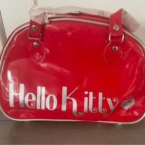 Red vinyl Hello Kitty bowling bag style purse